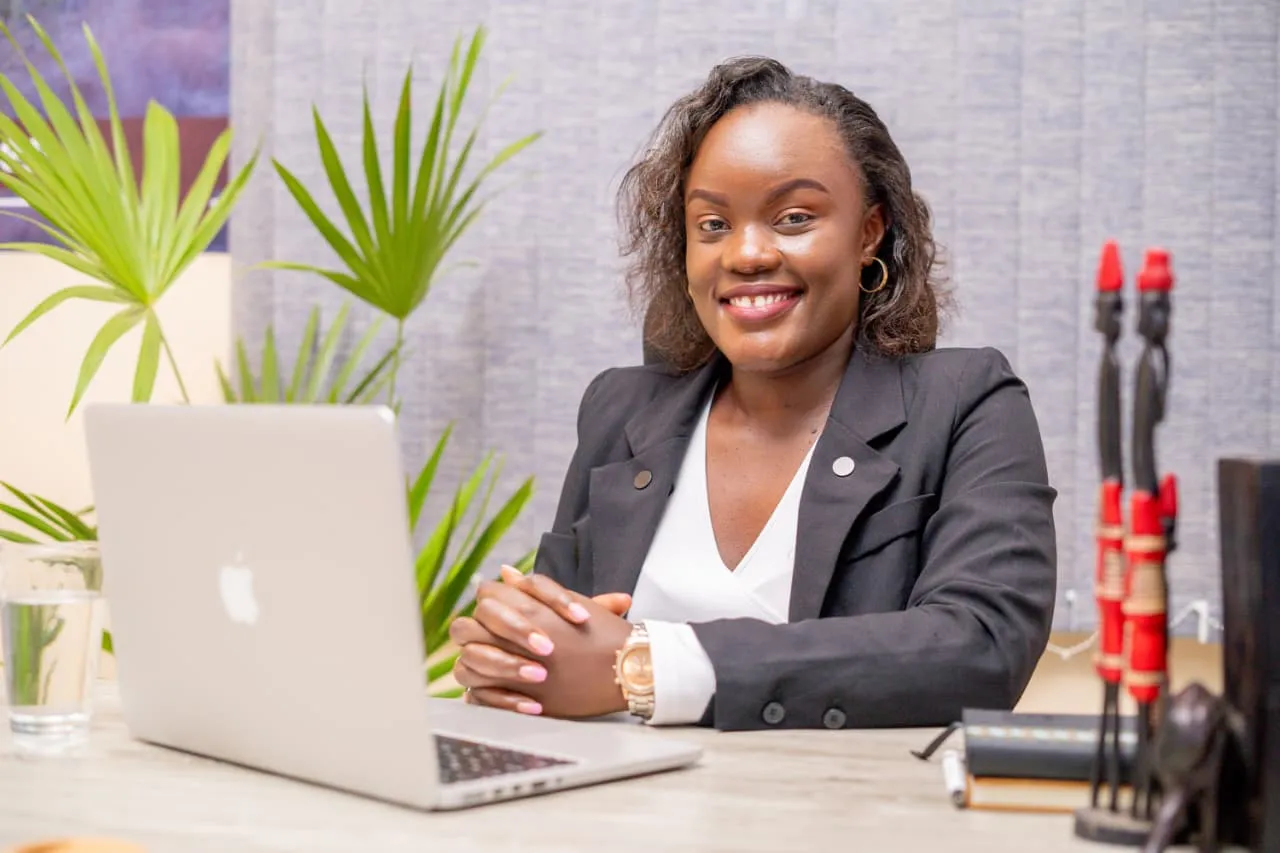 A Kilimore4CUS team member working at a desk
