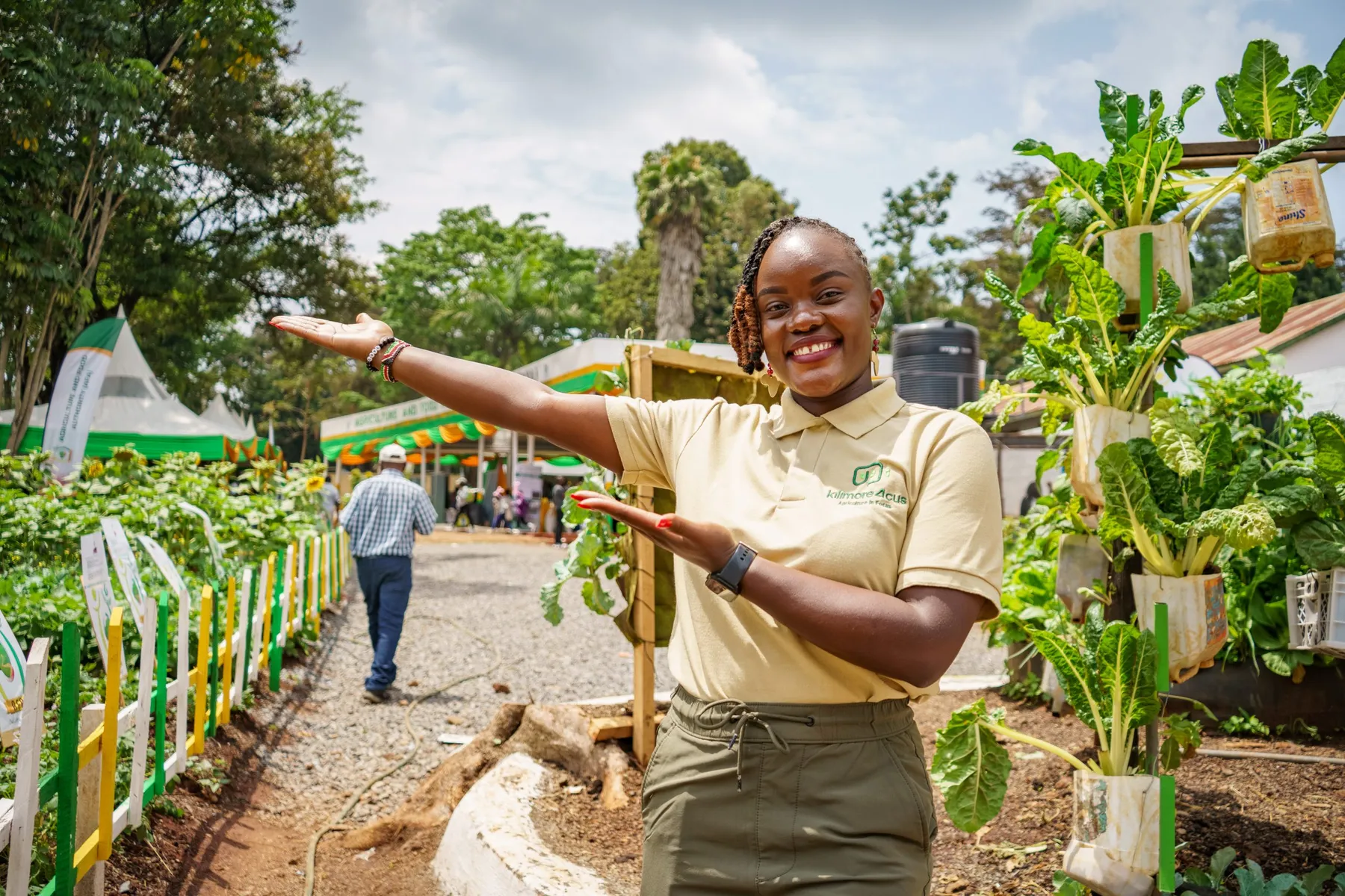 A Kilimore4CUS team member at an agricultural trade fair